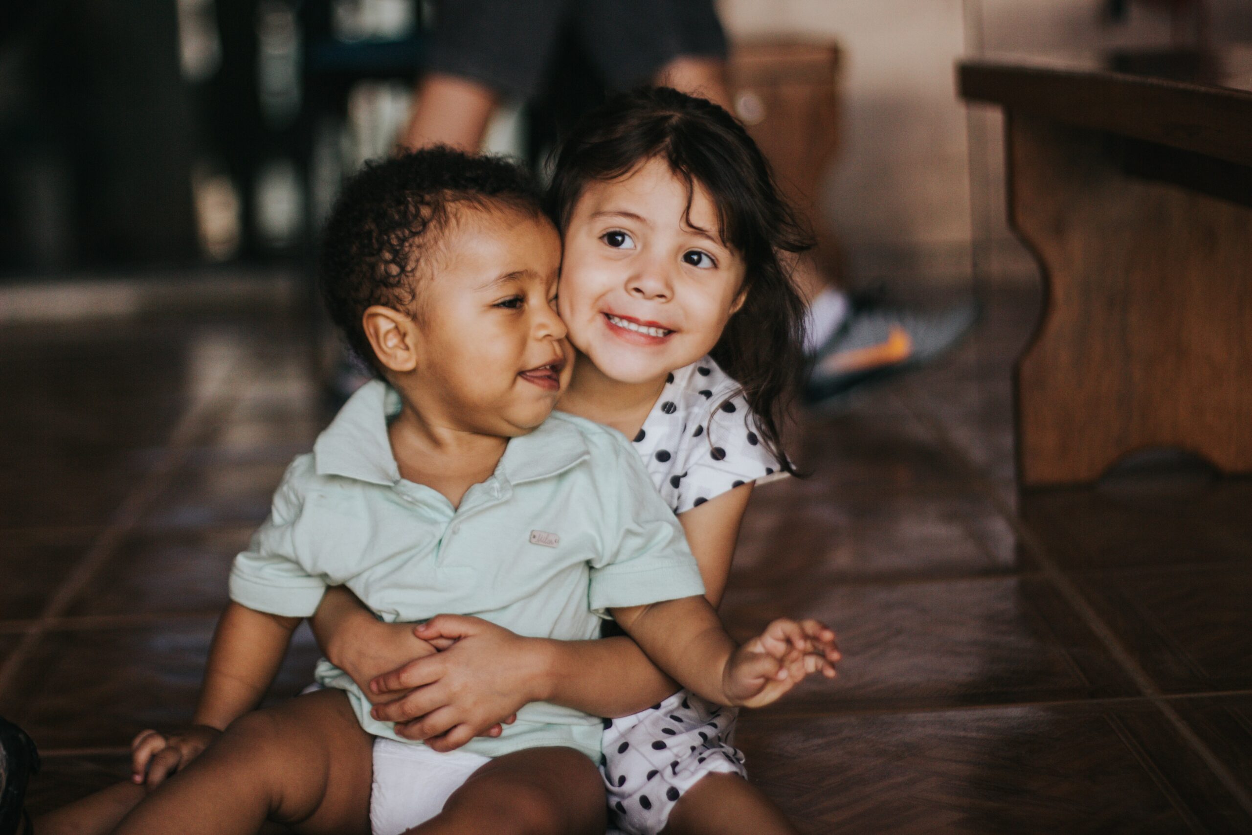 image by Chayene Rafaela on unsplash of two young kids